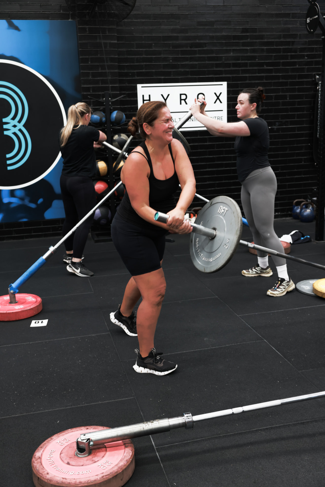 A member training with a barbell at BFT Abbotsford